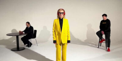Screenshot with Kate Blanchett in The Girl is Crying in Her Latte video, by Sparks.